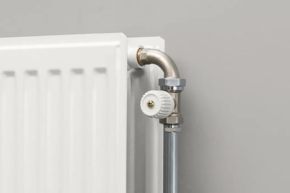 Knob in front of radiator