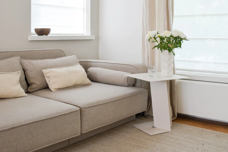 Square side table Sage with radiator cover at sofa